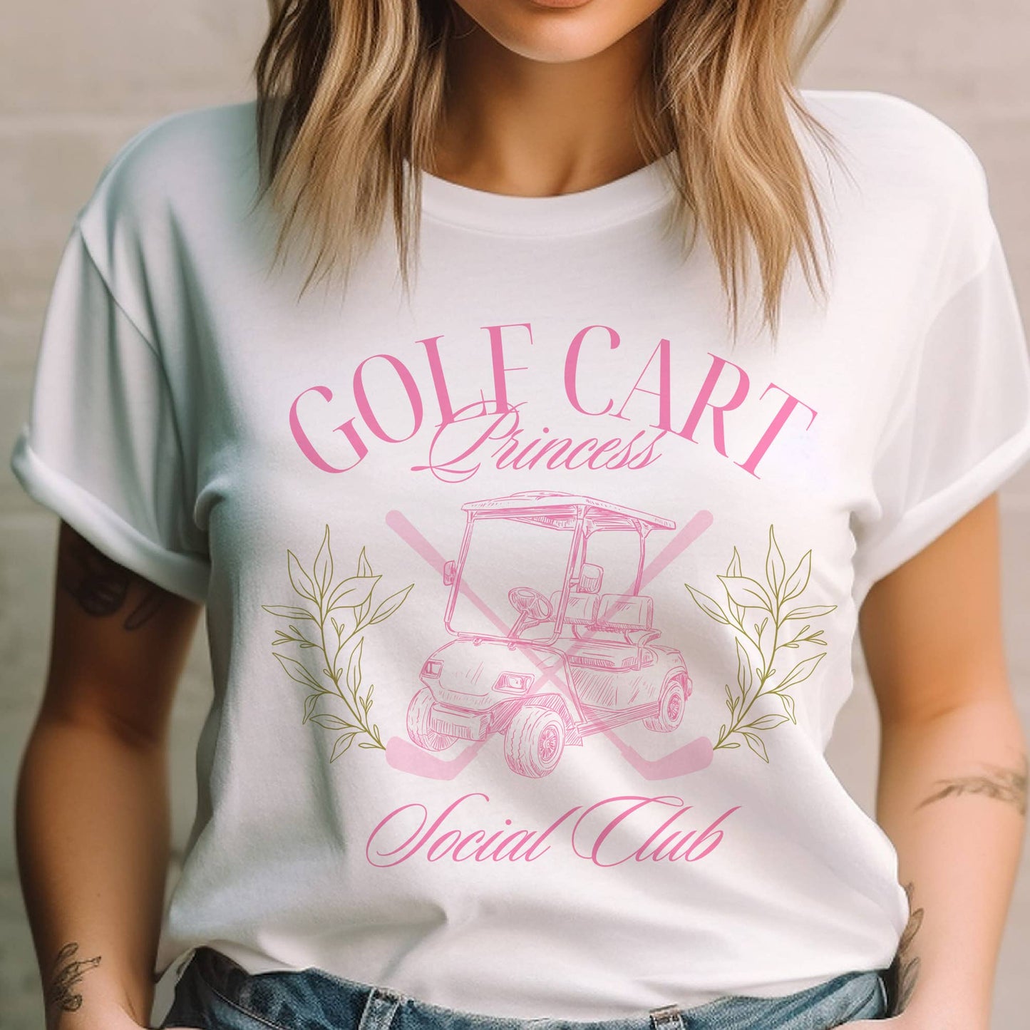A woman wearing a white t-shirt with 'GOLF CART Princess Social Club' text and a graphic of a pink golf cart.
