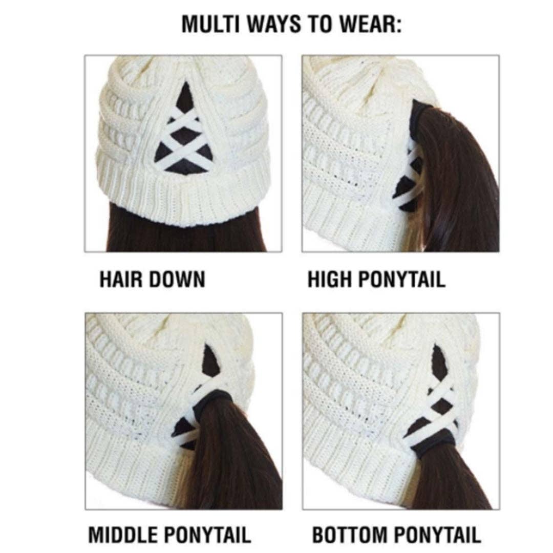 White knit beanie with black patterns shown worn in different styles on a white background.