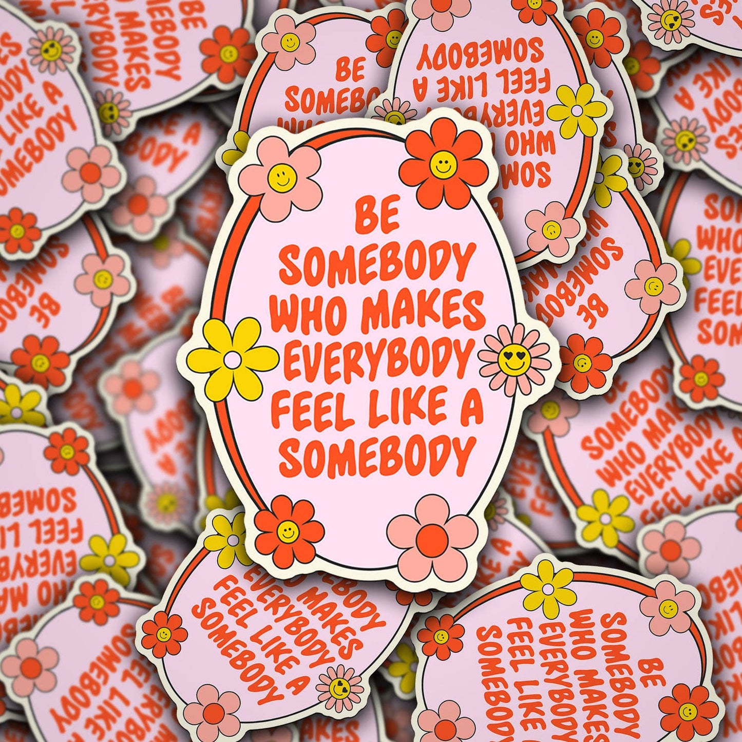 A collection of vinyl die cut decals with the phrase 'BE SOMEBODY WHO MAKES EVERYBODY FEEL LIKE A SOMEBODY' printed on them, surrounded by floral patterns.