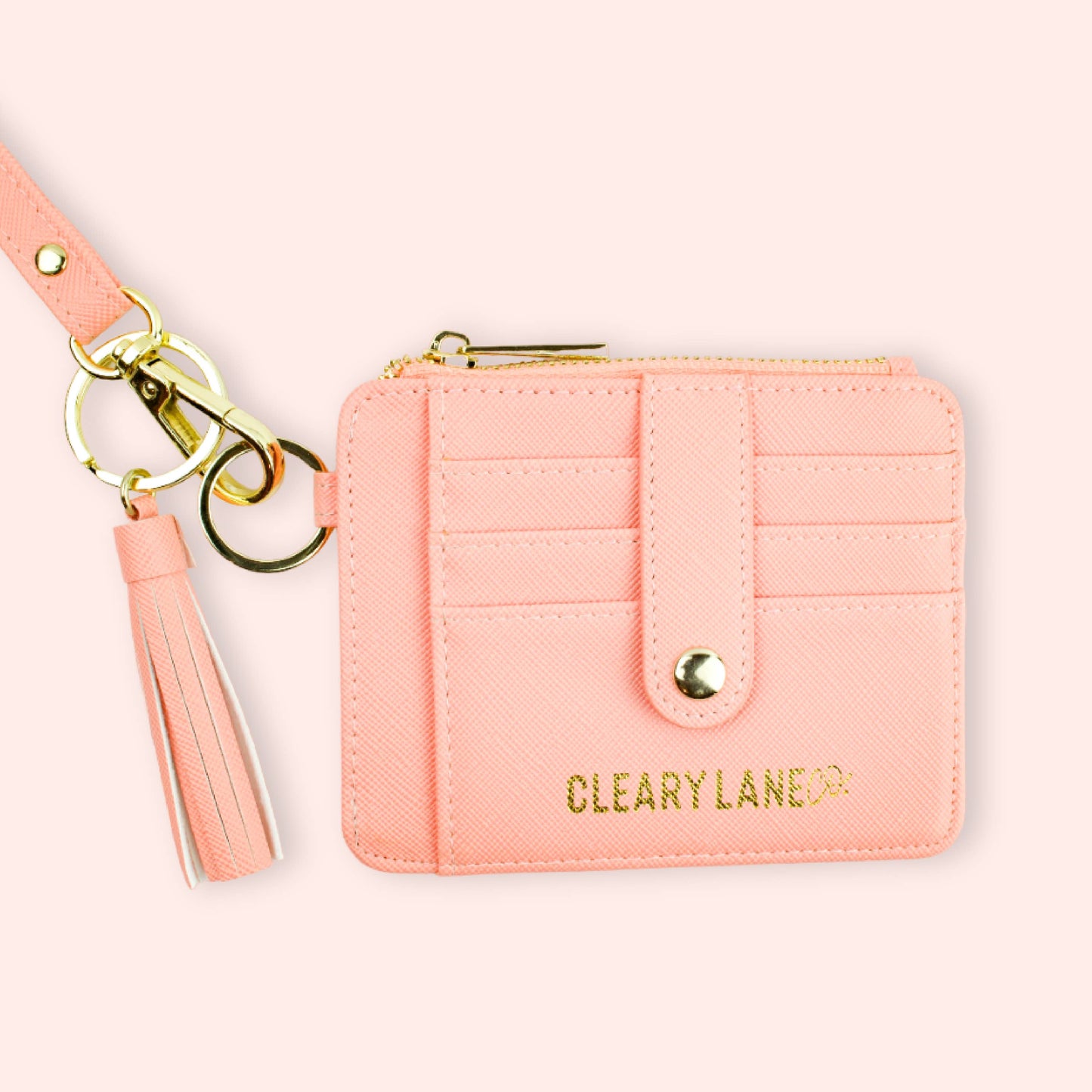pink wallet keychain with multiple keys in a colorful strap