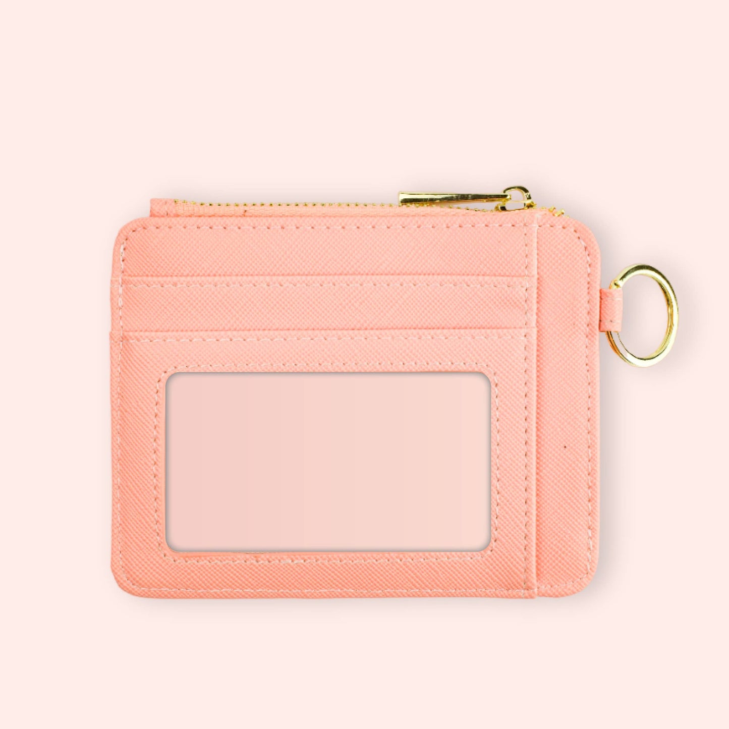 pink wallet keychain with multiple keys in a colorful strap
