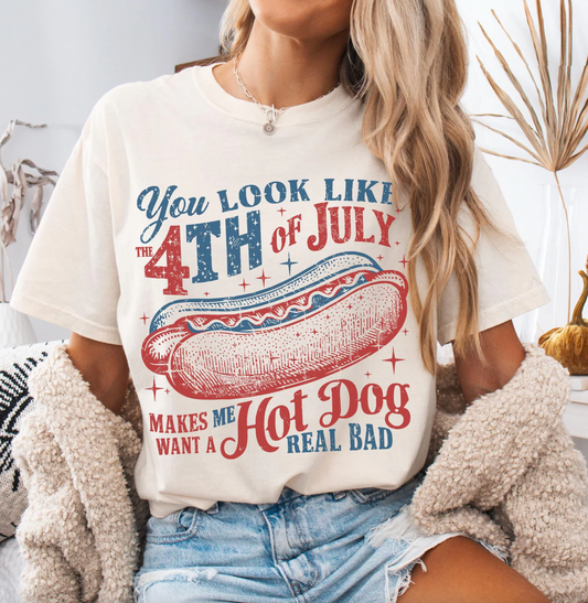 Person wearing a t-shirt with a 4th of July graphic design.