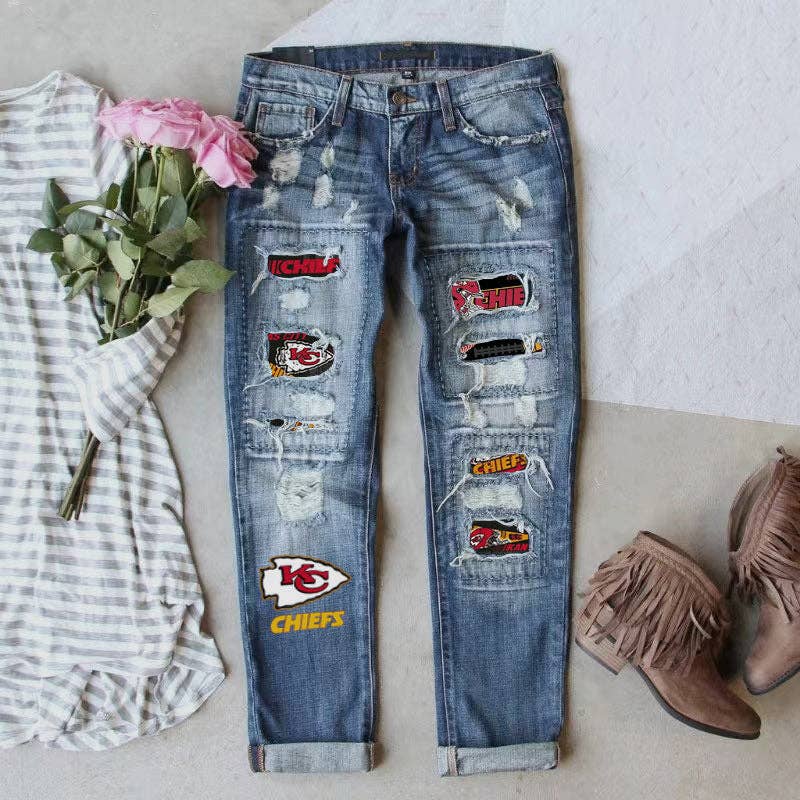 Chiefs football jeans on a tan background with boots and a gray striped shirt