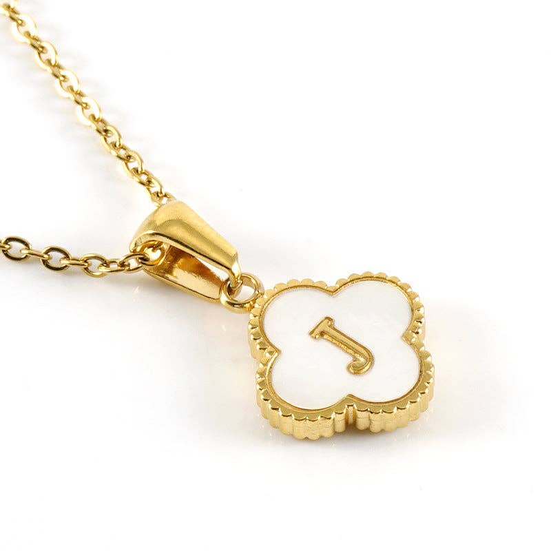 Gold necklace with a clover-shaped pendant featuring the number '1' on a white background
