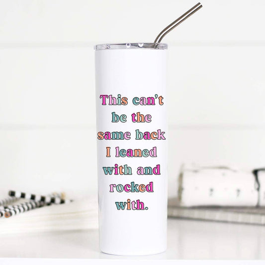 White tumbler with colorful text and a metal straw on a white background