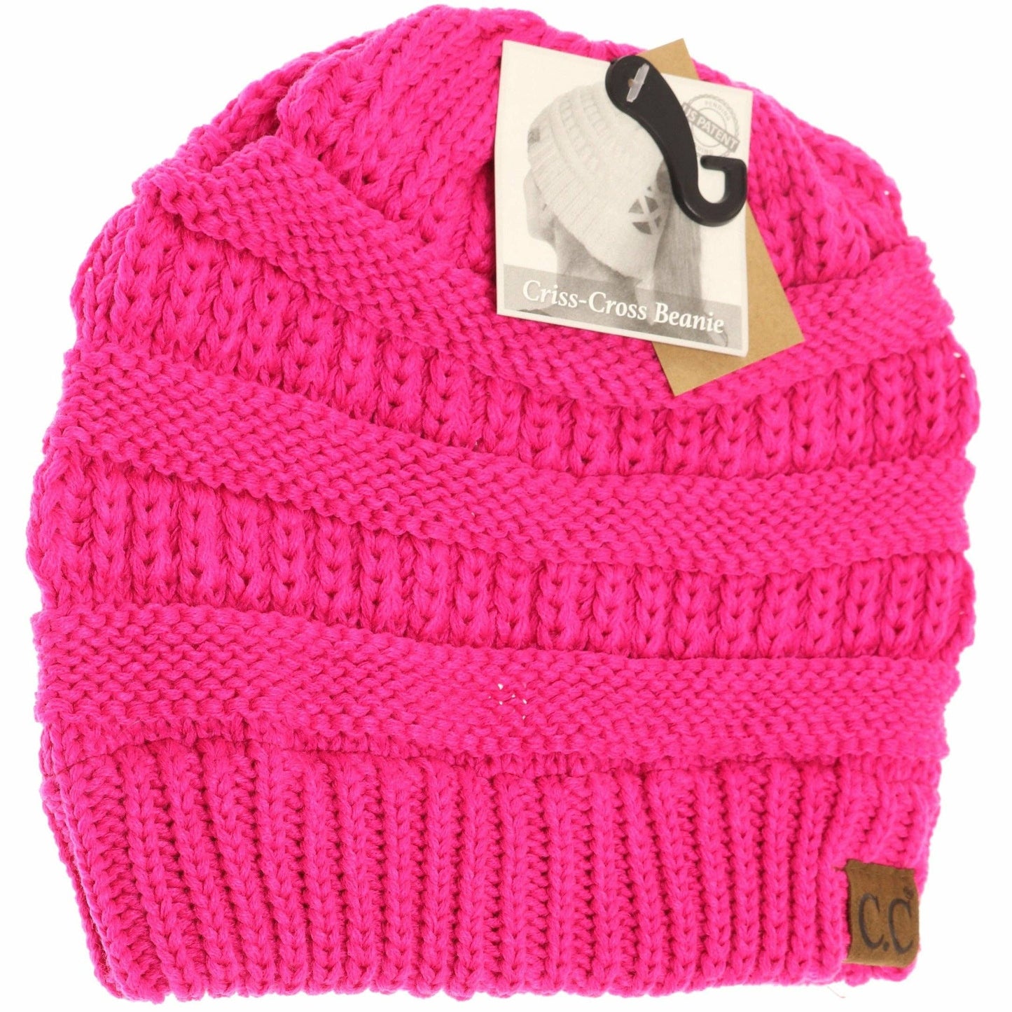 Pink knitted beanie with a brand tag on a white background