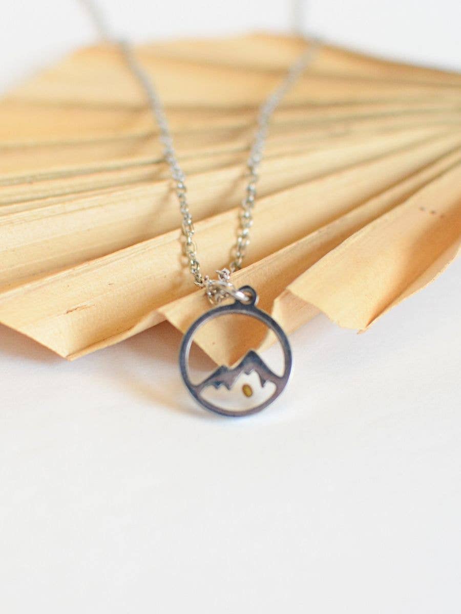 Necklace with a circular pendant on a white background